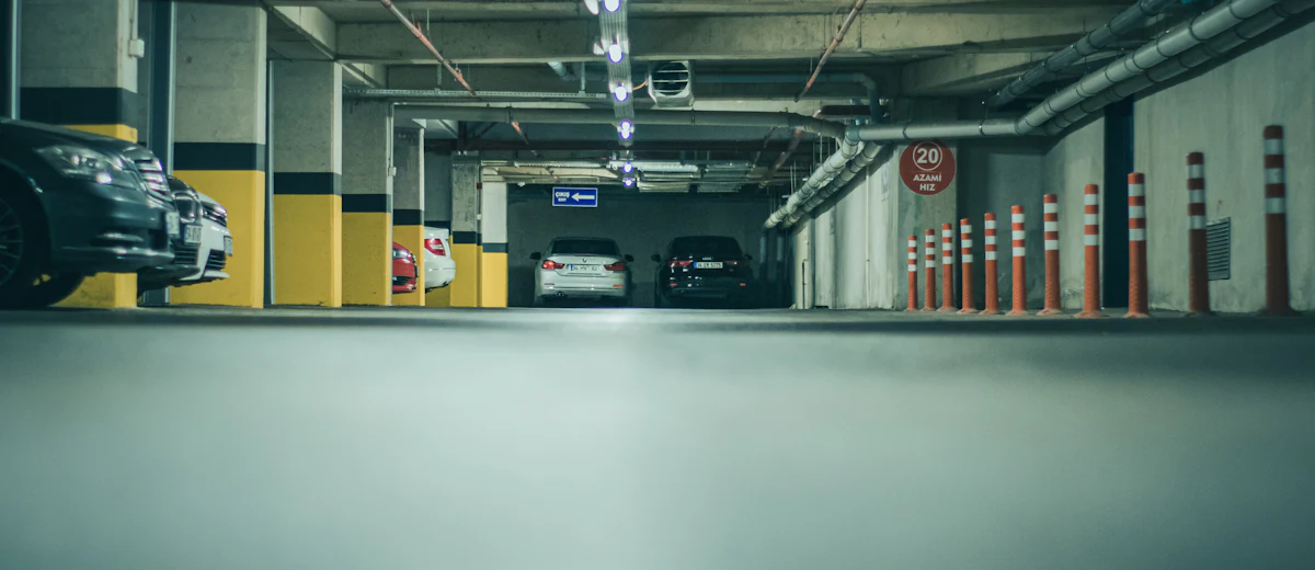 Residential co-op garage in Brooklyn below a courtyard, where a membrane leak was traced and sealed