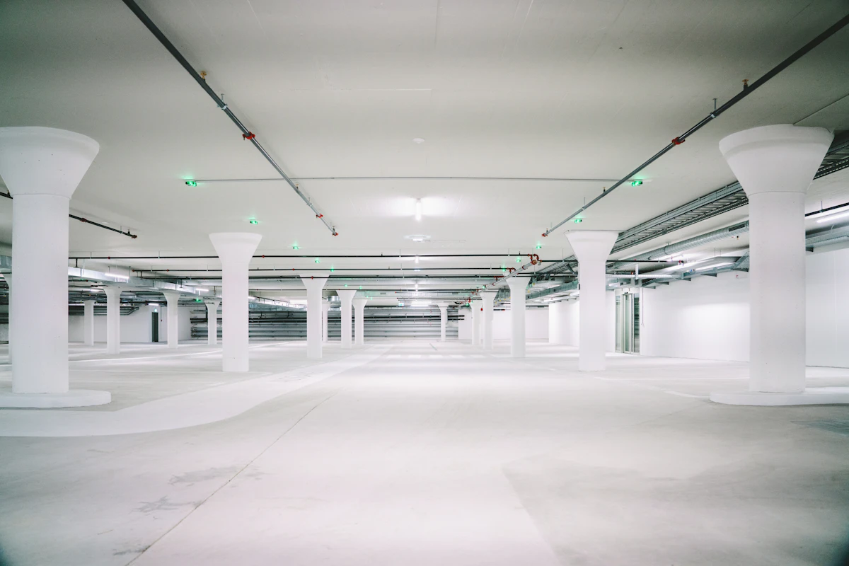 Clean, repaired parking garage level back in service after concrete repair in Brooklyn